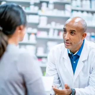 pharmacist talking to patient